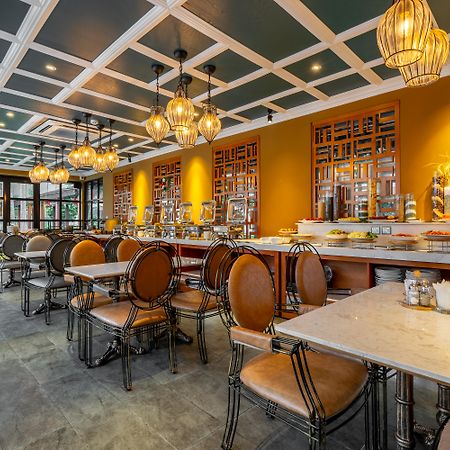 胡志明市萨默塞特酒店 外观 照片 The interior of the restaurant