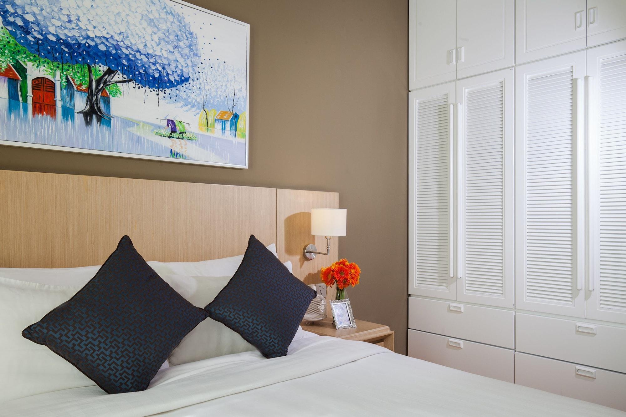 胡志明市萨默塞特酒店 外观 照片 A bedroom at the hotel