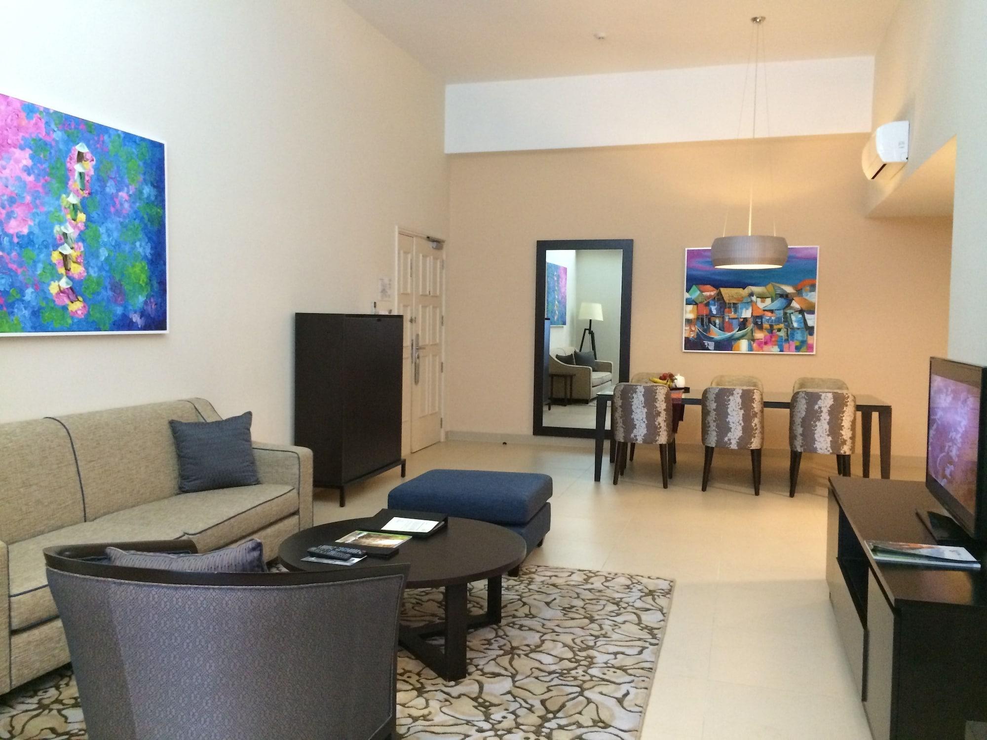 胡志明市萨默塞特酒店 外观 照片 A living room in a typical apartment at the Ritz-Carlton, DIFC