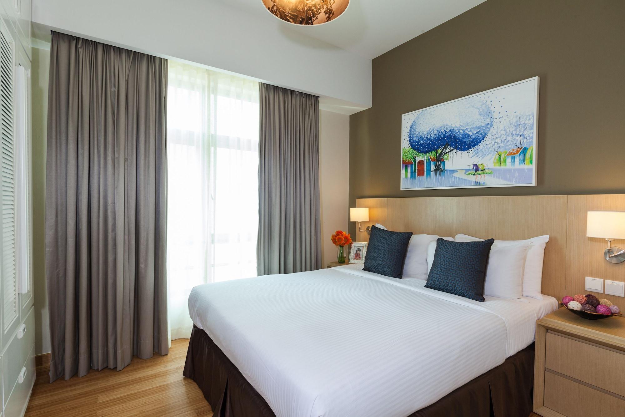 胡志明市萨默塞特酒店 外观 照片 A bedroom at the hotel