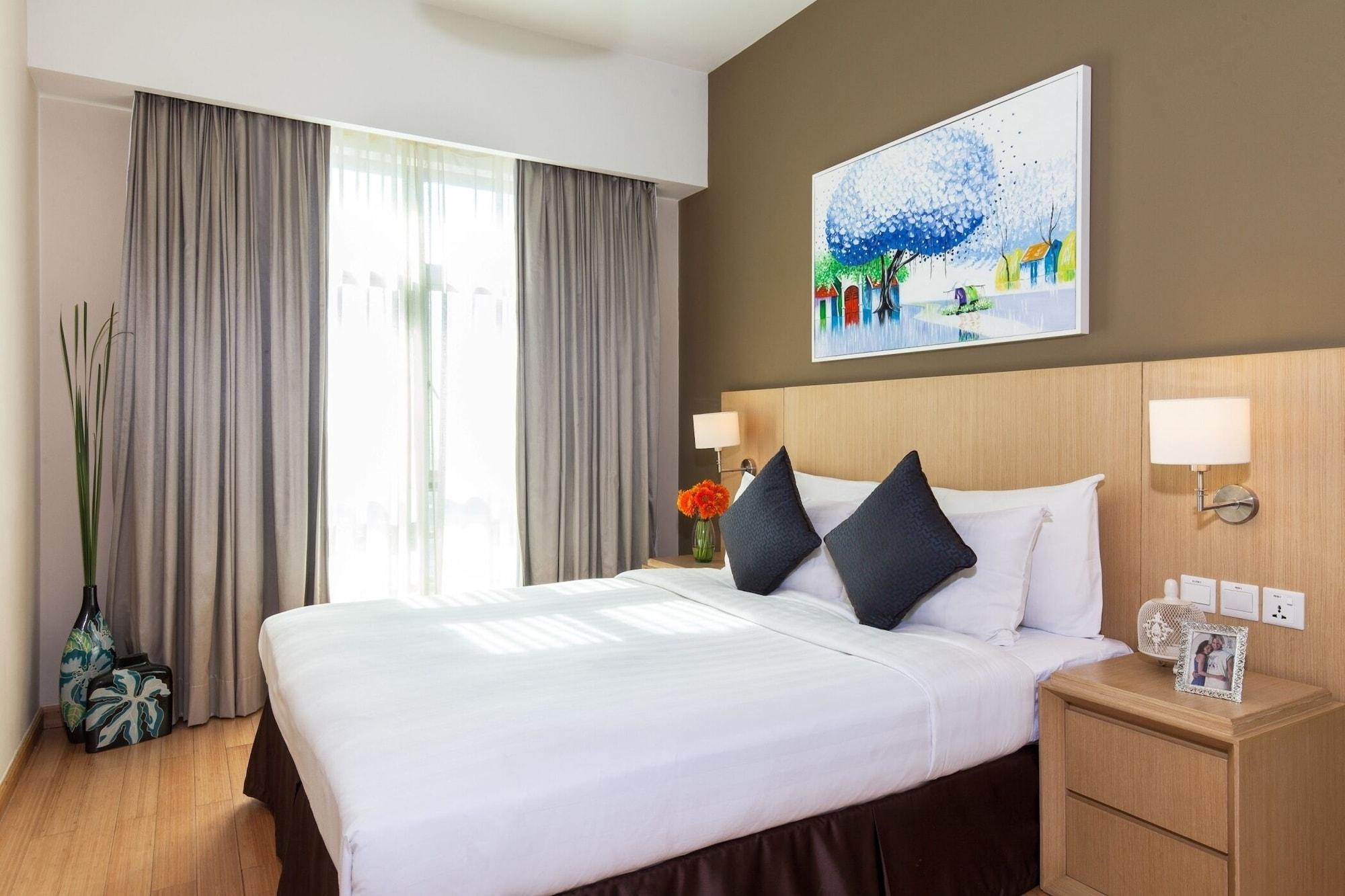胡志明市萨默塞特酒店 外观 照片 A bedroom at the hotel