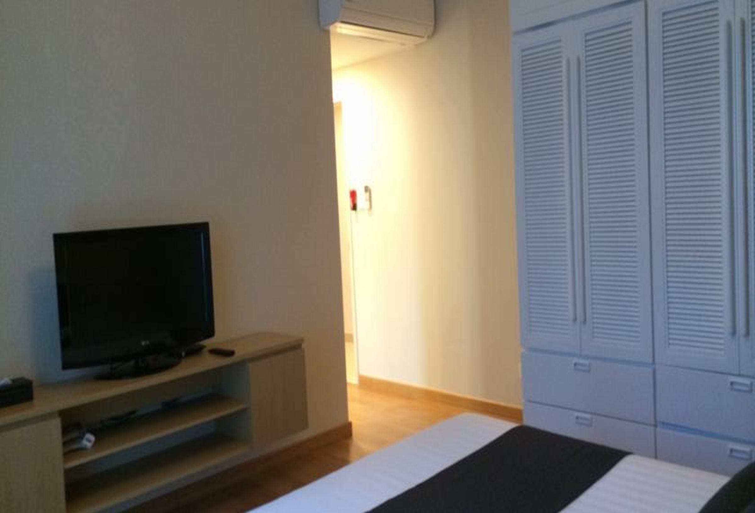 胡志明市萨默塞特酒店 外观 照片 A bedroom at the hotel