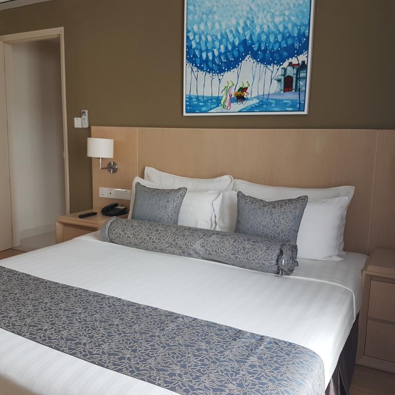 胡志明市萨默塞特酒店 外观 照片 A bedroom at the hotel